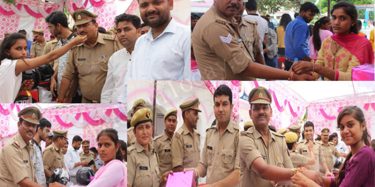 उझानी: बहनों ने बांधी पुलिसकर्मियों की कलाई पर राखी