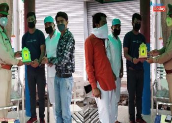 उझानी पुलिस को कोरोना योद्धा का सम्मान